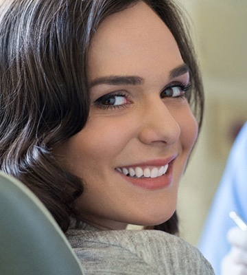 A woman completing her dental exam.