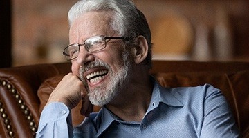 Man smiling with dentures in Colleyville   