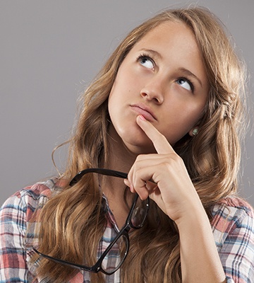 Young woman considering question