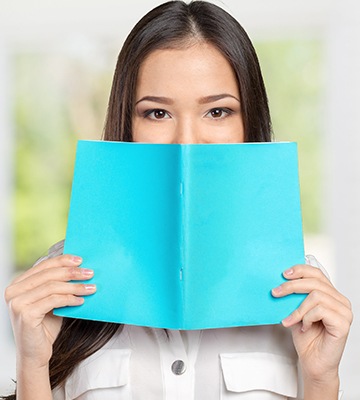 Woman hiding her smile