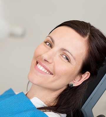 Smiling woman in dental chair