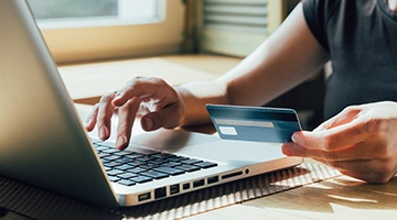 Woman using credit card