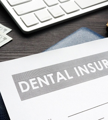 Dental insurance form resting on a table