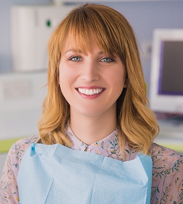 Smiling woman in dental chair