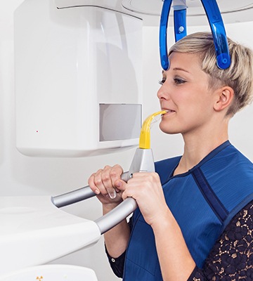 Woman receiving CT conebeam scanner