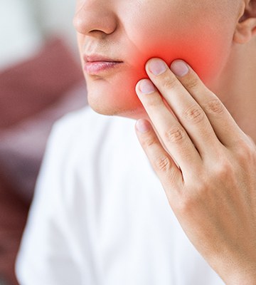 a dental patient with a sore mouth 