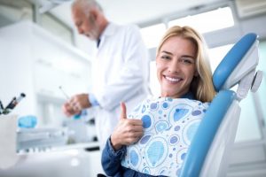 Dentist and patient, thumbs-up