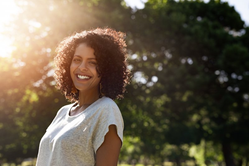 Woman smiling in the sun