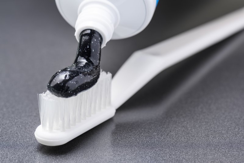 Charcoal toothpaste, a product used in DIY whitening