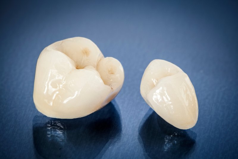 A closeup of two metal-free dental crowns