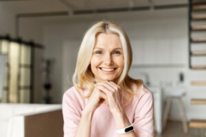 Smiling middle-aged woman with beautiful teeth 