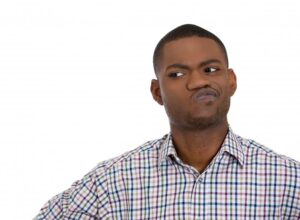 Man with a skeptical expression
